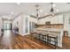 Open kitchen with granite countertops and stainless steel appliances at 8144 Sequester Loop, Land O Lakes, FL 34637