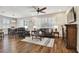 Spacious living room features hardwood floors, fireplace, and comfortable seating at 8144 Sequester Loop, Land O Lakes, FL 34637