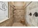 Walk-in shower with tiled walls, built-in seat, and dual shower heads at 8144 Sequester Loop, Land O Lakes, FL 34637