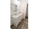 Double vanity bathroom with granite countertop at 9060 Moonlit Meadows Loop, Riverview, FL 33578