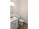 Clean bathroom with white vanity and tile floor at 9060 Moonlit Meadows Loop, Riverview, FL 33578
