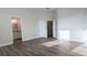 Main bedroom with en-suite bathroom and laundry access at 9060 Moonlit Meadows Loop, Riverview, FL 33578