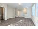 Bright and airy living room with wood-look floors at 9060 Moonlit Meadows Loop, Riverview, FL 33578