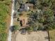 Aerial view of neighborhood showing houses and vacant lot at 11262 Sneeze Rd, Brooksville, FL 34614