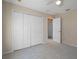 Spacious bedroom with large closet and carpet flooring at 11262 Sneeze Rd, Brooksville, FL 34614