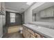 Clean bathroom with a tub, shower, and updated vanity at 1321 Riverside Dr, Tarpon Springs, FL 34689
