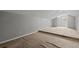 Ample bonus room with carpet and multiple windows at 1321 Riverside Dr, Tarpon Springs, FL 34689