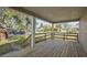 Charming home with a spacious front porch, perfect for relaxing and enjoying the outdoors at 1321 Riverside Dr, Tarpon Springs, FL 34689