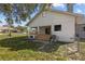 View of the house exterior from the backyard at 1321 Riverside Dr, Tarpon Springs, FL 34689