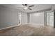 Spacious living area with tile floors and access to other rooms at 1321 Riverside Dr, Tarpon Springs, FL 34689