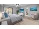 Relaxing main bedroom with tile flooring and access to en-suite bathroom at 1321 Riverside Dr, Tarpon Springs, FL 34689