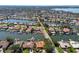 Scenic aerial view of waterfront properties lining canals with boat docks, highlighting the attractive coastal community at 1997 Kansas Ne Ave, St Petersburg, FL 33703