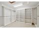 Spacious walk-in closet with extensive shelving and organization at 1997 Kansas Ne Ave, St Petersburg, FL 33703