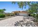 Beautiful home featuring a paved driveway, well maintained landscaping and a two car garage at 1997 Kansas Ne Ave, St Petersburg, FL 33703