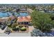 Waterfront home with lush landscaping, private dock, boat and beautiful terracotta roof at 1997 Kansas Ne Ave, St Petersburg, FL 33703