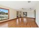 Spacious living room featuring hardwood floors, neutral walls, recessed lights, scenic views, and natural light at 1997 Kansas Ne Ave, St Petersburg, FL 33703