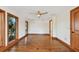 Bright living room with hardwood floors, neutral walls, wood trim, recessed lights, and natural light at 1997 Kansas Ne Ave, St Petersburg, FL 33703