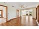 Bright living room featuring hardwood floors, neutral walls, wood trim, and recessed lighting at 1997 Kansas Ne Ave, St Petersburg, FL 33703