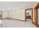 Spacious open living area with tile floors and an adjoining bathroom at 1997 Kansas Ne Ave, St Petersburg, FL 33703