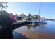 Stunning view of the canal, a private dock, and a sailboat at 1997 Kansas Ne Ave, St Petersburg, FL 33703