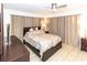 Comfortable bedroom with a double bed, ample closet space and neutral decor at 209 Westwinds Dr, Palm Harbor, FL 34683