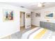 Bedroom with ensuite access and gray dresser at 209 Westwinds Dr, Palm Harbor, FL 34683