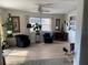 Inviting living room with hardwood floors, stylish seating, and abundant natural light, creating a relaxing atmosphere at 209 Westwinds Dr, Palm Harbor, FL 34683