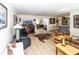 Spacious living room with a cowhide rug and large TV at 209 Westwinds Dr, Palm Harbor, FL 34683