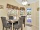 Breakfast nook with table and chairs, view of the pool at 2107 Gallagher Rd, Dover, FL 33527