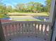 Balcony with decorative railing overlooking golf course at 3050 Wentworth Way, Tarpon Springs, FL 34688