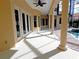 Spacious covered patio with pool view, offering a relaxing outdoor space at 3050 Wentworth Way, Tarpon Springs, FL 34688