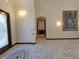 Elegant entryway with tiled flooring, arched doorway, and decorative glass door at 3050 Wentworth Way, Tarpon Springs, FL 34688