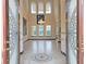 Elegant entryway with double doors and decorative glass at 3050 Wentworth Way, Tarpon Springs, FL 34688