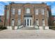 Brick building with grand entrance, ideal for a club or office at 3050 Wentworth Way, Tarpon Springs, FL 34688