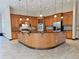 Large kitchen featuring wood cabinetry, an island, and stainless steel appliances at 3050 Wentworth Way, Tarpon Springs, FL 34688