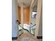 Curved staircase with glass block accents and tile flooring at 3050 Wentworth Way, Tarpon Springs, FL 34688