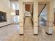 Foyer with staircase, chandelier, and view into adjacent living spaces at 3050 Wentworth Way, Tarpon Springs, FL 34688