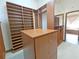Spacious walk-in closet with built-in shelving and mirrored doors at 3050 Wentworth Way, Tarpon Springs, FL 34688