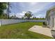 Large backyard with grassy lawn and patio at 4501 Helena Ne St, St Petersburg, FL 33703
