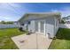 Spacious backyard, grassy lawn and patio area at 4501 Helena Ne St, St Petersburg, FL 33703