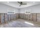 New tile floors in bedroom under renovation; exposed framing at 4501 Helena Ne St, St Petersburg, FL 33703
