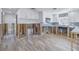 Under renovation, this kitchen features white cabinets and a light blue tile backsplash at 4501 Helena Ne St, St Petersburg, FL 33703