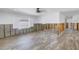 Living room undergoing renovation, featuring new flooring and exposed framing at 4501 Helena Ne St, St Petersburg, FL 33703
