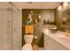 Elegant bathroom with a glass shower and modern vanity at 4705 1St Ne St # 326, St Petersburg, FL 33703