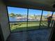 Screened balcony overlooking marina and water at 614 Yardarm Dr # 7, Apollo Beach, FL 33572