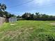 Lush backyard with a weathered shed and privacy fencing at 6366 38Th N Ave, St Petersburg, FL 33710