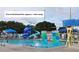 Community pool at Northwest Rec featuring slides, diving boards, and a rock-climbing wall for Gathering fun at 6366 38Th N Ave, St Petersburg, FL 33710
