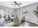Bright living room offers a comfortable sofa, natural light, and smooth transition to other rooms at 6366 38Th N Ave, St Petersburg, FL 33710