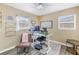 Bright home office featuring an adjustable desk and modern decor with natural light at 6366 38Th N Ave, St Petersburg, FL 33710