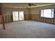 Spacious living room undergoing renovation with exposed walls at 7028 Southwind Dr, Hudson, FL 34667